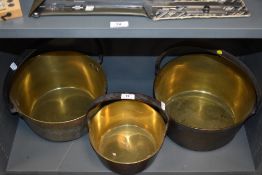 Three vintage brass jam pans.