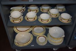 A collection of Midwinter tableware having white ground with cream and burgundy bands with gilt