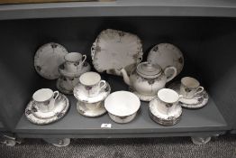 A collection of Shelley pottery Art Deco table ware, to include teapot, cups and saucers and plates,