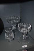 Three etched items of Emma Bridgwater glass, including vase and two candle holders.