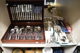 A cased canteen of silver plated cutlery, in the Kings pattern, and other cutlery including