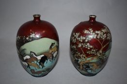 A pair of late 19th/ early 20th century Japanese/Chinese white metal cloisonné vases, having