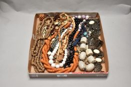A selection of beaded necklaces, including rustic styles.