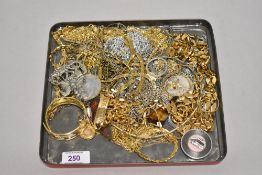 A tray of decorative gold coloured and white metal jewellery, to include an enamelled bangle, a '