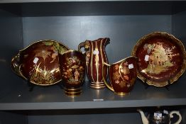 Four pieces of Carlton ware Rouge Royale and a similar Wade jug.