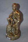 A vintage cast brass study of a miner.