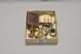 A selection of gents vintage cufflinks and a ring and a tie pin.