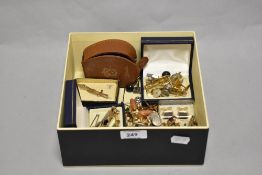 A box of miscellaneous gold coloured jewellery, to include cufflinks, bar brooches, and other items