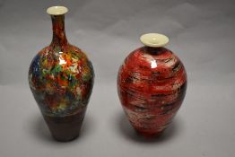 Two Russell Akerman vases, one of bottle form with narrow neck, having multi coloured glaze and