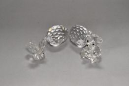Four Swarovski crystal glass ornaments or paperweights, to comprise a teddy bear, a butterfly, and