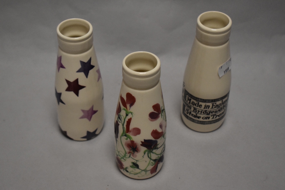 Three Emma Bridgwater miniature milk bottles.