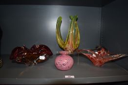 Four pieces of heavy art glass, including mottled pink Mdina vase.