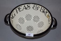 An Emma Bridgwater enamel colander ' Shelling peas and broadbeans'.