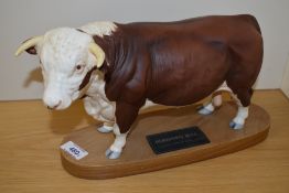 A Connoisseur Beswick Pottery Hereford Bull on plinth A2542A, in matte finish.