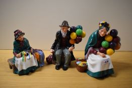 Three Royal Doulton figurines, to include; The old balloon seller, Silk and ribbons and Balloon