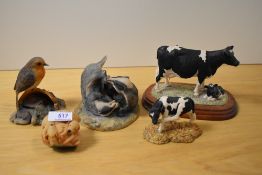 A selection of Border Fine Arts studies, including cows, robin, badgers and dogs.