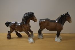 Two Beswick Pottery Shire horse studies in brown gloss finish.