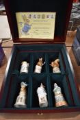 A Royal Worcester presentation box with six golden edition 100th anniversary celebration studies and