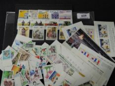 KOREA & MACAU UNMOUNTED MINT COLLECTION IN CLEAR FACED SLEEVE, MUCH BY SETS Clear faced sleeve