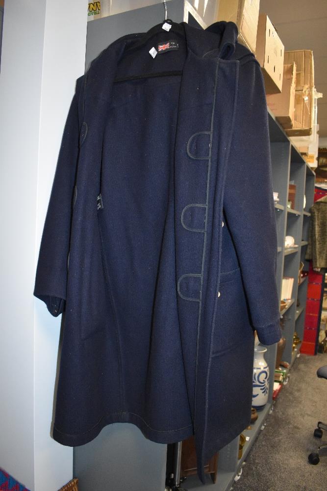 A navy blue woolen duffle coat