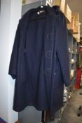 A navy blue woolen duffle coat