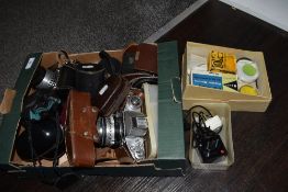 An assorted collection of vintage cameras and accessories, to include Exakta, Exa 11a, and other