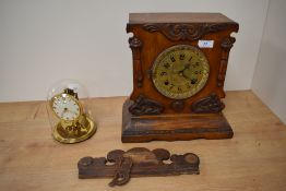 A late Victorian oak cased mantle clock, two train movement, having a brass dial with arabic