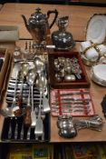 A variety of vintage flat ware, comprising; cased sets of knives including silver plated, ladle,