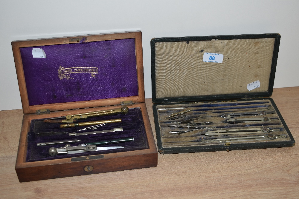 Two cased vintage draughtsman's sets, containing compasses and other engineering instruments