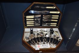 An early 20th Century oak canteen of silver plated cutlery, by Viners