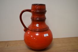 A 1960s West German Jasba vase, red glaze, and measuring 35cm tall