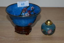 A Chinese cloisonne bowl, on blue ground, raised on a hardwood stand, together with a cloisonne