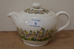 A 20th Century Copeland Spode bullet form tea pot, hand painted with floral patterns, and