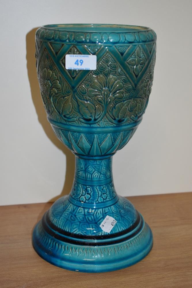 A 19th/20th Century blue majolica vase of goblet form, decorated with geometric patterns and