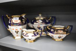 A four piece late 19th/early 20th Century Century Gaudy Welsh tea/coffee service, by S.Johnson