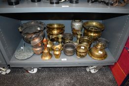 A collection of mixed vintage brass ware and similar, including planters, plant atomiser, rose