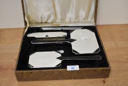 An Art Deco and guilloche enamel dressing table set in shagreen case