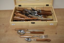 A small quantity of Sanenwood stainless steel cutlery