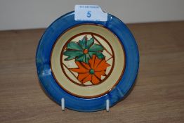 A 1930s Clarice Cliff Fantasque patterned ashtray, diameter 12cm