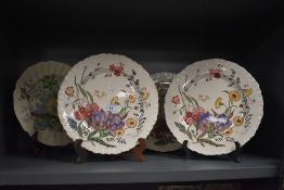 A group of three Wedgwood transfer printed plates, of botanical designs, decorated with Ranunculus