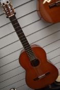 A vintage Taurus classical guitar, model 49, with hard case