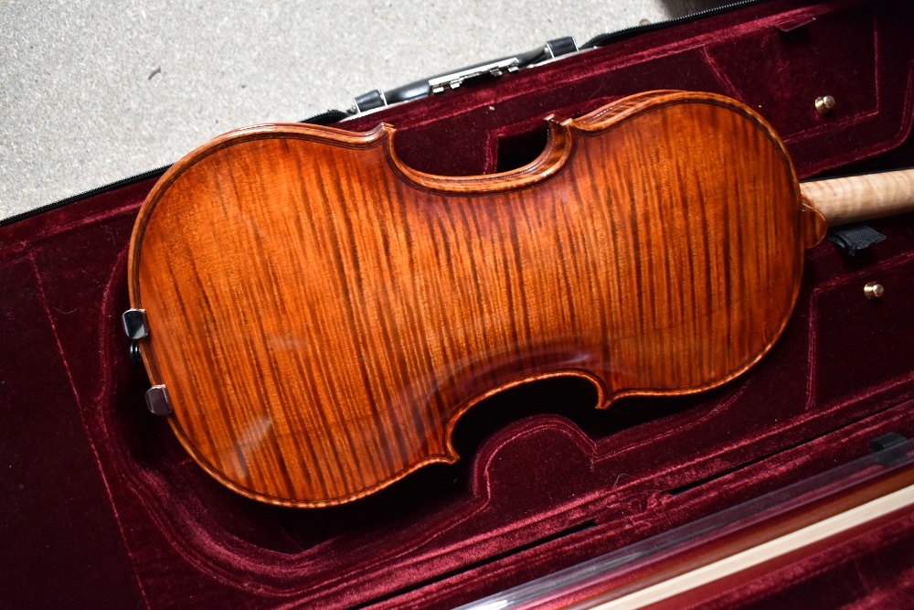 A modern violin having one piece 14inch back , labelled Bellolino, with plush fitted case and bow - Image 2 of 4