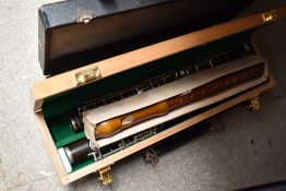 A selection of clarinet parts, wooden recorder etc