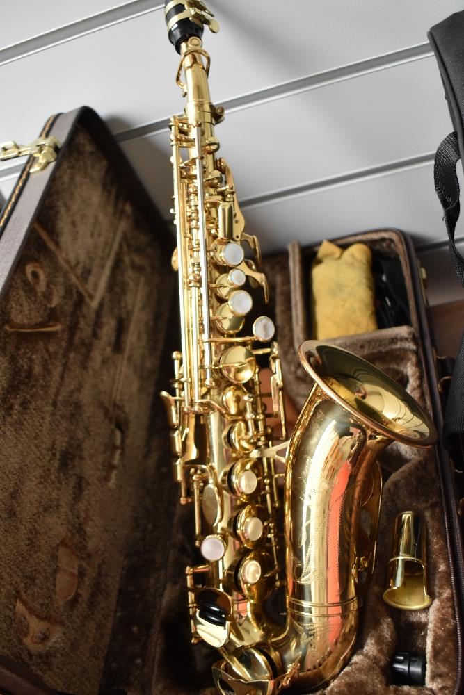 A Yanagisawa saxophone of small proportions, SC901, curved soprano