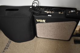 A Vox AV 30 combo amp, with footswitch and softcover
