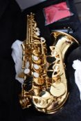 A Slade saxophone of small proportions, serial number 00184277