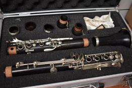 A traditional blackwood clarinet, stamped Noblet, Paris