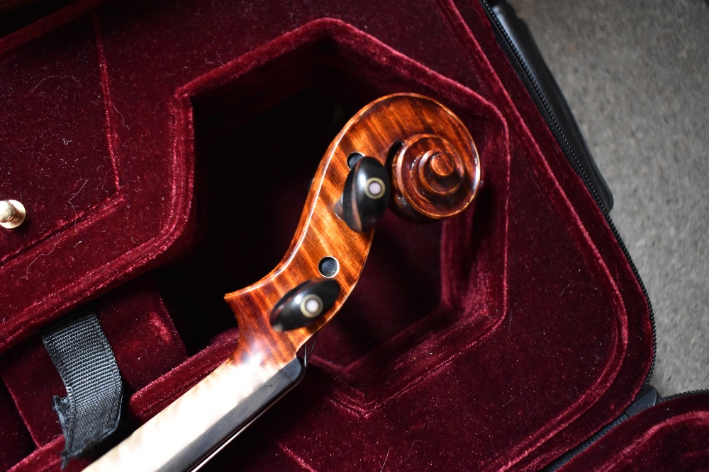 A modern violin having one piece 14inch back , labelled Bellolino, with plush fitted case and bow - Image 4 of 4