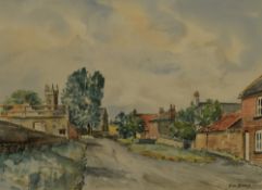 J.W Dyas (20th Century), a watercolour, A village scene with a row of houses and church in the