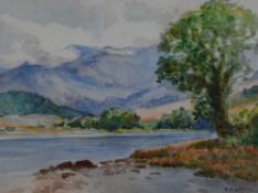 R.A. Laycock (20th Century, British), a watercolour, A lake scene with hills beyond, signed to the